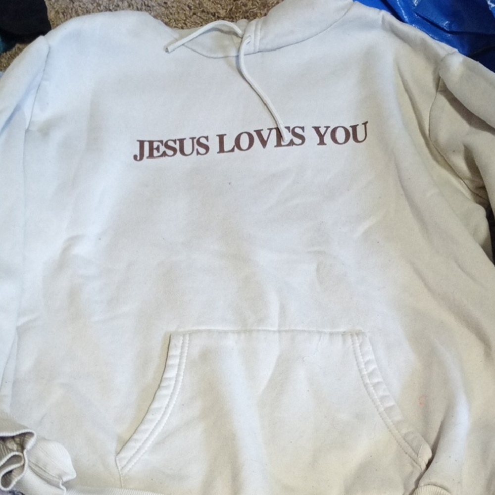White Hoodie with 'Jesus Loves You' Print